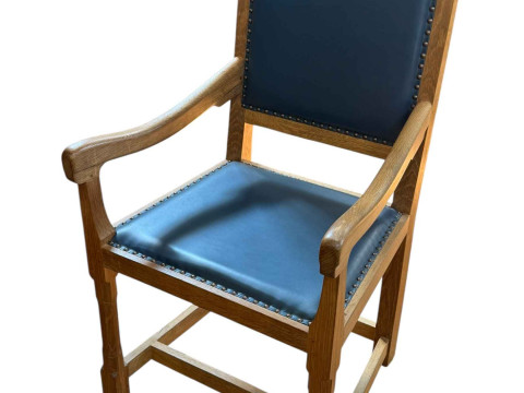 Peter 'Rabbitman' Heap oak and blue studded hide elbow chair.