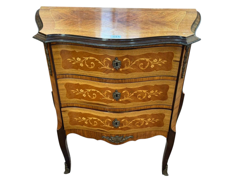 Continental marquetry inlaid two drawer serpentine front chest, 71cm by 68cm by 35cm.