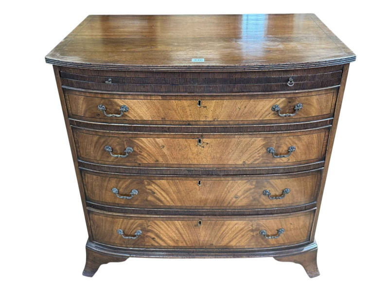 19th Century mahogany bow front Bachelors chest having brush slide above four long drawers on splayed bracket feet, 81cm by 81.5cm by 53cm.