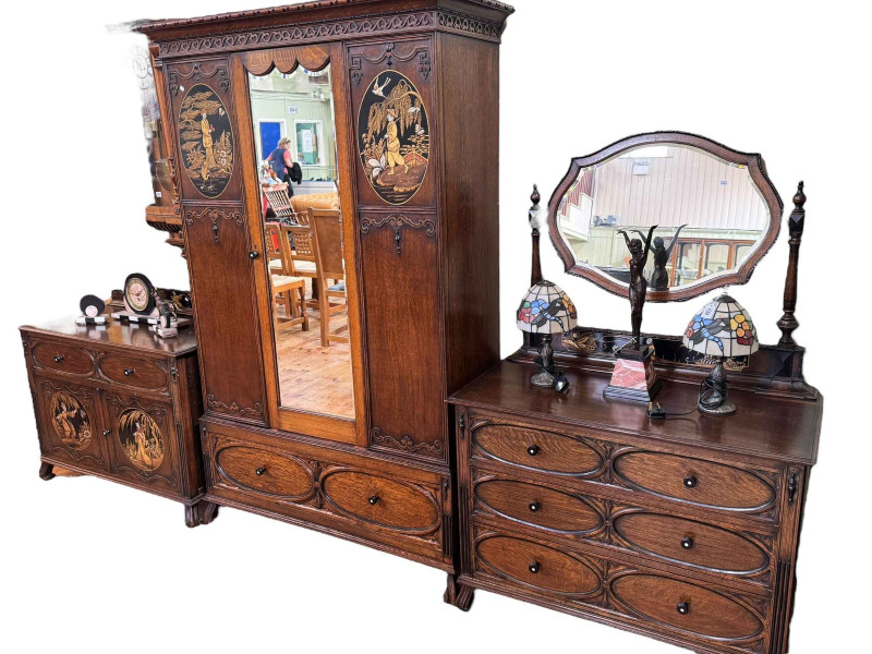 Early 20th Century oak and chinoiserie decorated six piece bedroom suite comprising mirror door wardrobe, three drawer dressing table, two door linen chest and two bedroom chairs and double bedstead.