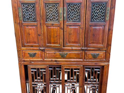 Chinese lacquered wedding cabinet having four fretwork panel doors above...