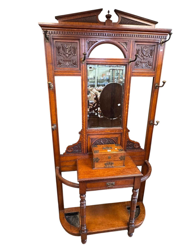 Victorian carved oak mirror back hallstand, 214cm by 109.5cm by 35cm.