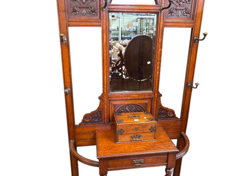 Victorian carved oak mirror back hallstand, 214cm by 109.5cm by 35cm.