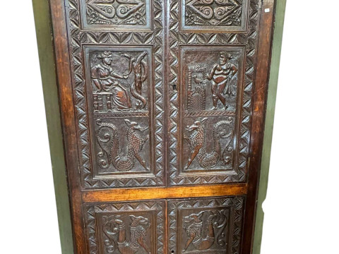 Victorian carved oak four door standing corner cabinet, 196cm.