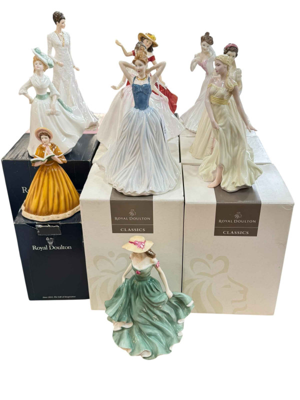 Ten Royal Doulton lady figures.