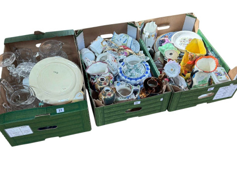Three boxes of assorted glass and china including Wade and Doulton figures,...