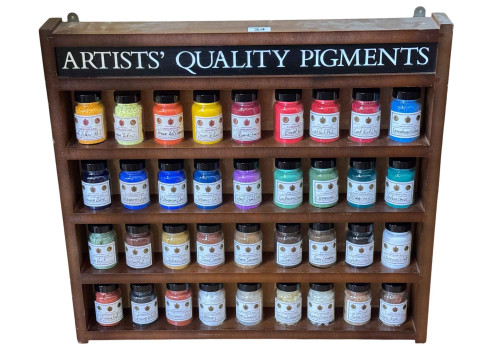 Thirty six Artists Quality Pigment Jars in wall cabinet.