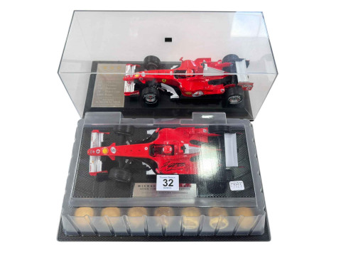 Four various Michael Schumacher limited edition F1 model vehicles. thumbnail