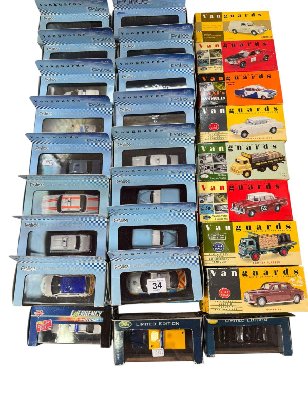 Collection of Vanguards model vehicles including many examples of Police Vehicles through the years, approximately 50 in total.