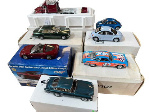 Seven boxed model vehicles, 1993 Mack Truck, two VW Beetles, Bentley Arnage,...