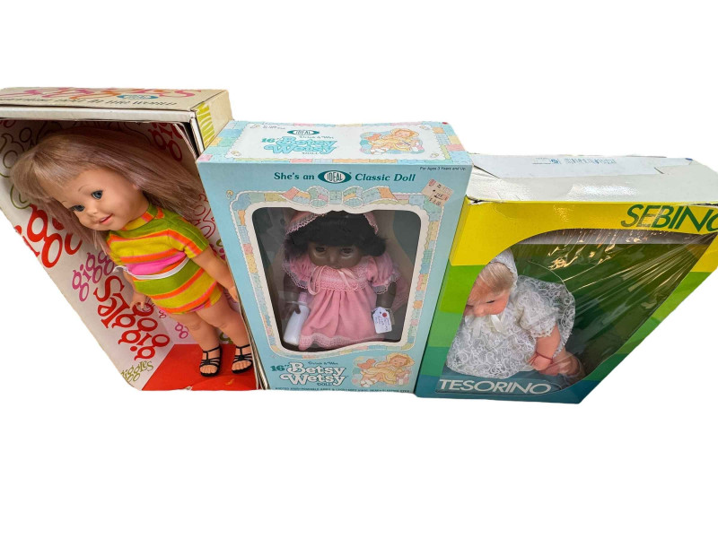 Twelve assorted boxed dolls including Ideals Saucy Walker doll, Effanbee, Ideal Giggles and Betsy Wetsy dolls, Sebino, etc.