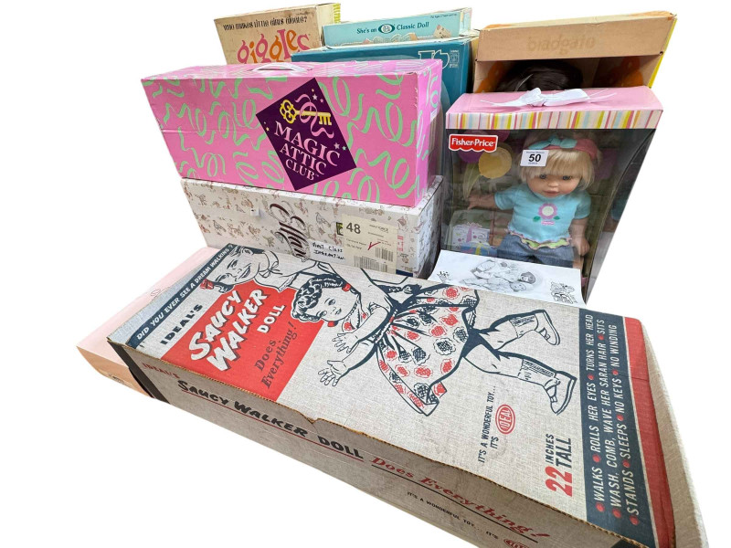 Twelve assorted boxed dolls including Ideals Saucy Walker doll, Effanbee, Ideal Giggles and Betsy Wetsy dolls, Sebino, etc.