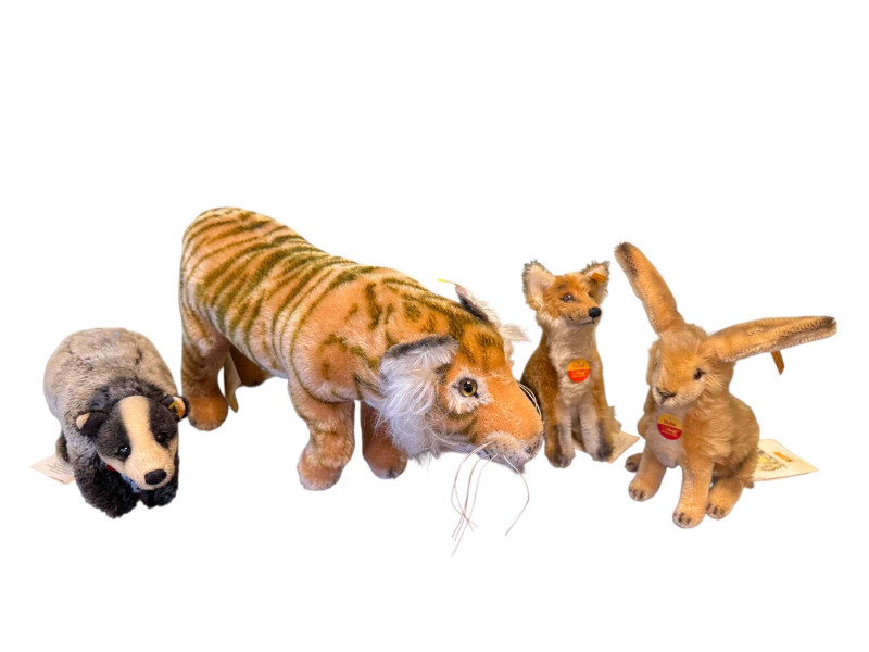 Four Steiff soft toy animals, Toger, Dachs, Hase and Fuchs.