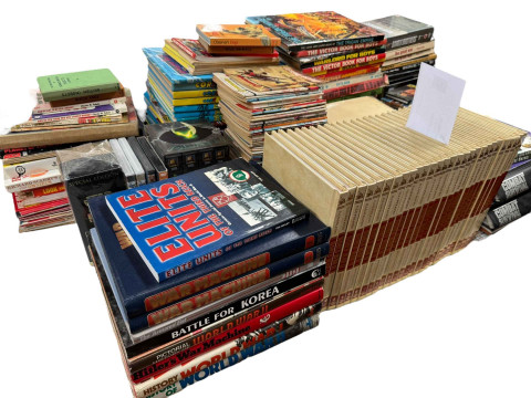 Collection of illustrated World War II encyclopedias, children's annuals,...