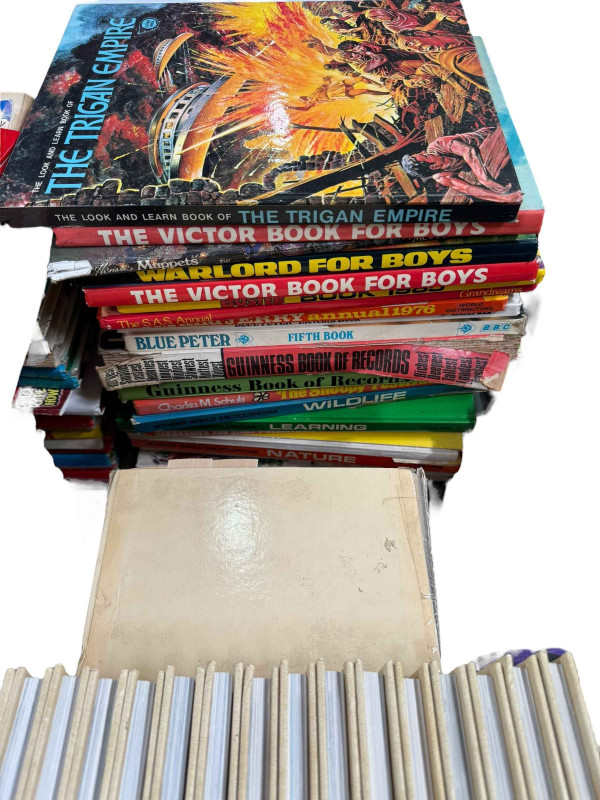 Collection of illustrated World War II encyclopedias, children's annuals, war books, etc.