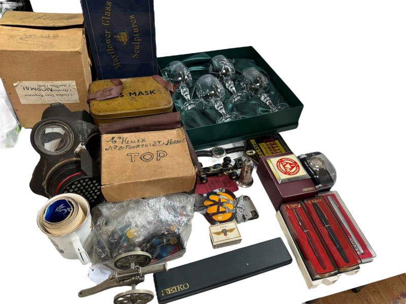 War gas masks, Parker pens, boxed glasses, wristwatch, car badge, etc.