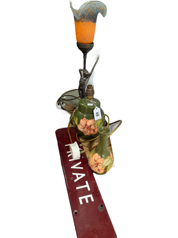 Two pieces of Moorcroft including table lamp and vase, enamel sign and a figural lamp with shade.