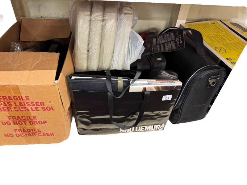 Collection of car accessories and memorabilia including brochures, vintage oil can, Mercedes caps, etc.