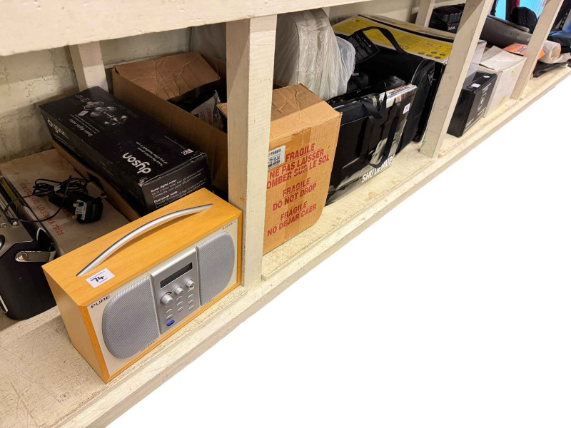 Collection of car accessories and memorabilia including brochures, vintage oil can, Mercedes caps, etc.