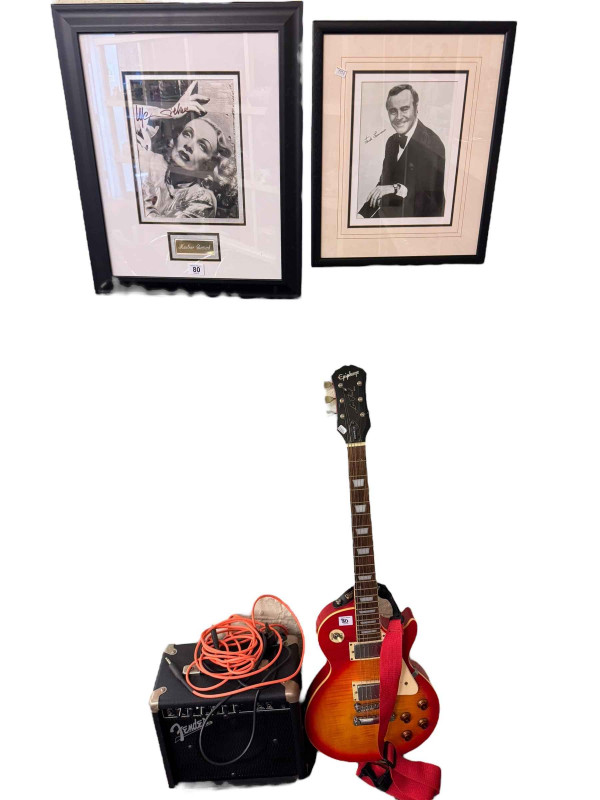 Epiphone Les Paul guitar with amp and two framed autograph reprinted photographs.