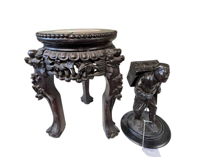 Oriental plant stand and an elder figure.
