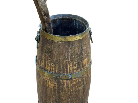 Coopered barrel stick stand and walking sticks.