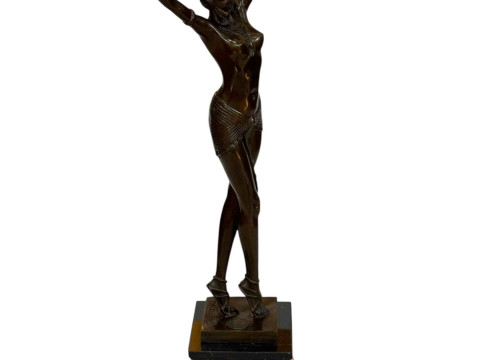 Art Deco style bronze lady in pose on marble plinth, 54cm high.