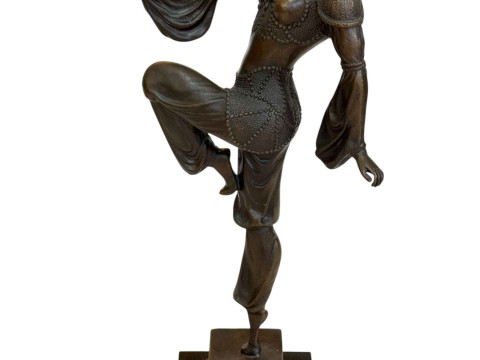 Art Deco style bronze lady in dancing pose on marble base, 44cm.