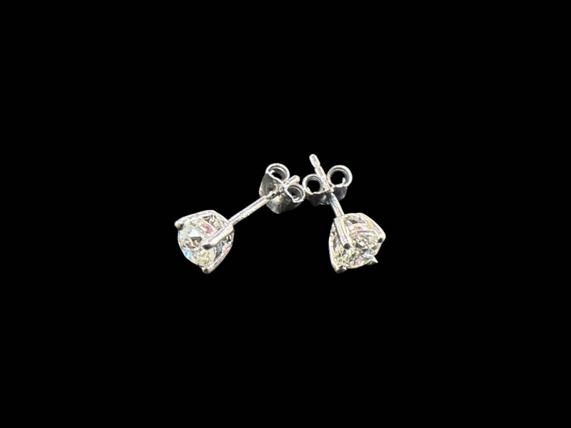Pair of 18 carat white gold and diamond stud earrings.