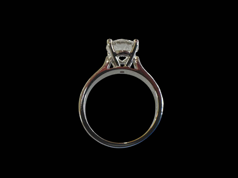 Impressive platinum set diamond solitaire ring, the round cut diamond over 2 carats, size M.