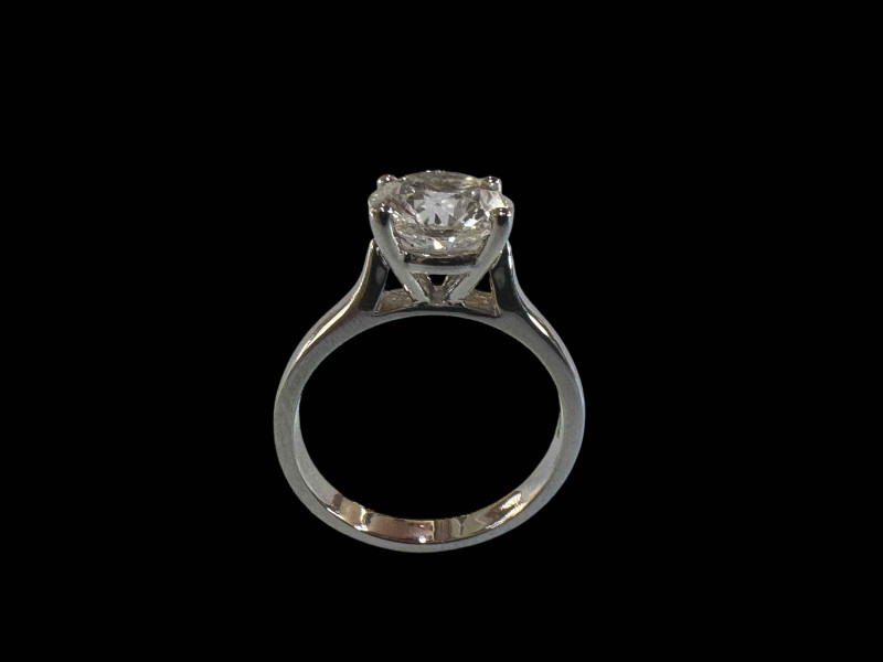 Impressive platinum set diamond solitaire ring, the round cut diamond over 2 carats, size M.