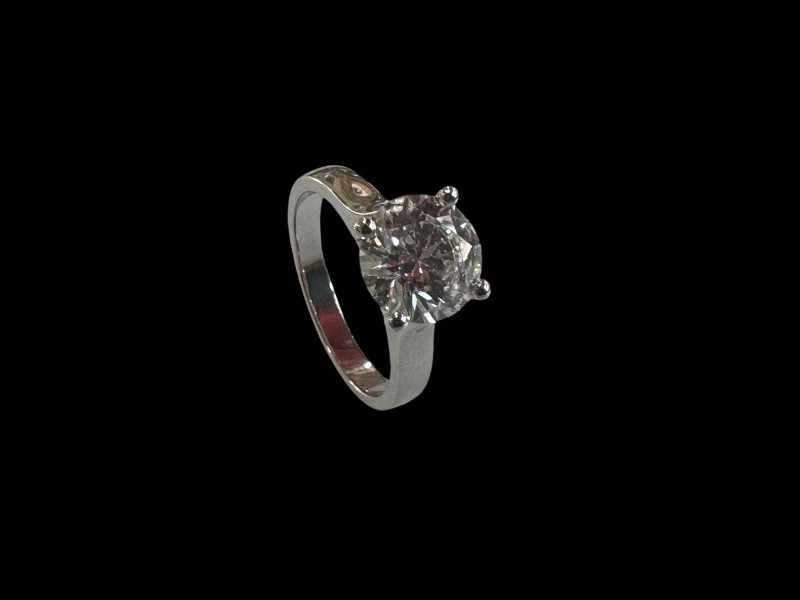 Impressive platinum set diamond solitaire ring, the round cut diamond over 2 carats, size M.