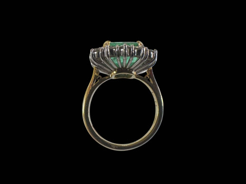 Good quality natural emerald and diamond cluster ring set in 18 carat white gold with yellow shank, size Mœ, with diamond grading report. thumbnail