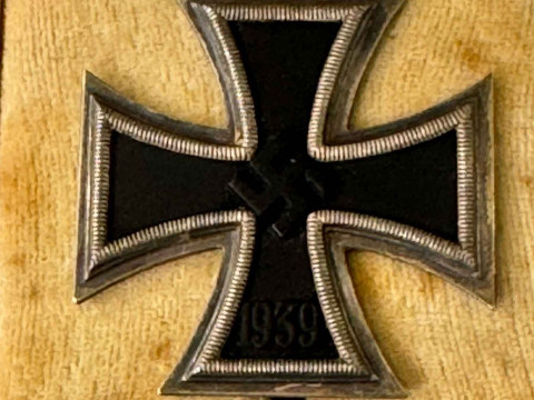 A WWI First Class Iron Cross badge, marked 65.