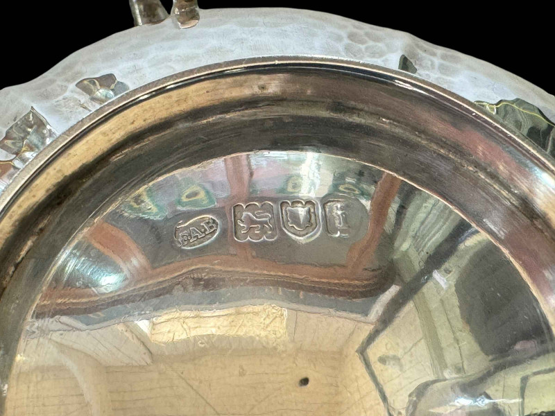 Silver hammered three handled lobed bowl, Frederick Augustus Burridge, London 1904, 11.5cm diameter.