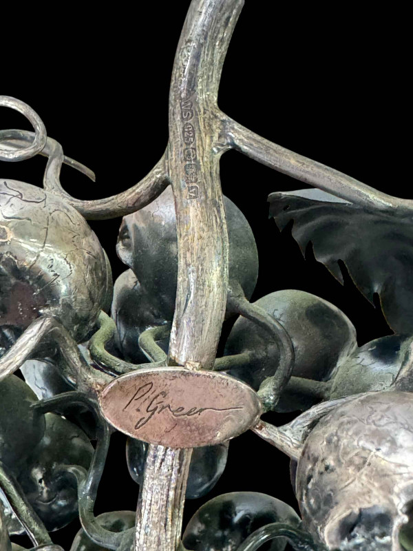 P Green silver skull grape sculpture, signed and hallmarked, 17cm length.