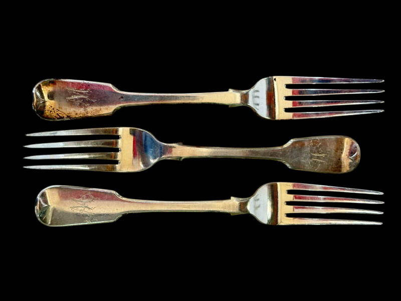 Three George IV silver fiddle pattern table forks, London 1828.