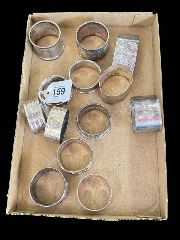 Collection of thirteen silver napkin rings.