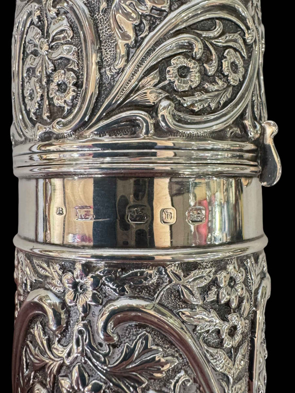 Late Victorian silver caster embossed with scrolling foliage, Birmingham 1895, 13.5cm.