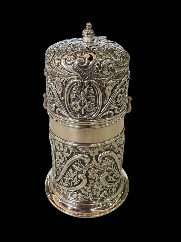 Late Victorian silver caster embossed with scrolling foliage, Birmingham 1895, 13.5cm.