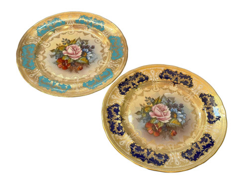 Two Aynsley plates signed J A Bailey, centrally decorated with roses,...