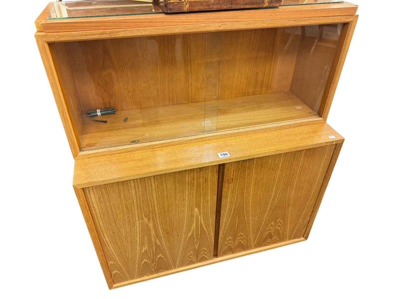 Adjustable teak three section wall unit.
