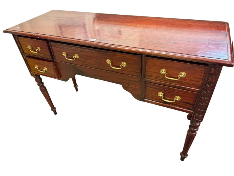 Polished five drawer serving table on turned legs, 89cm by 137cm by 50cm.