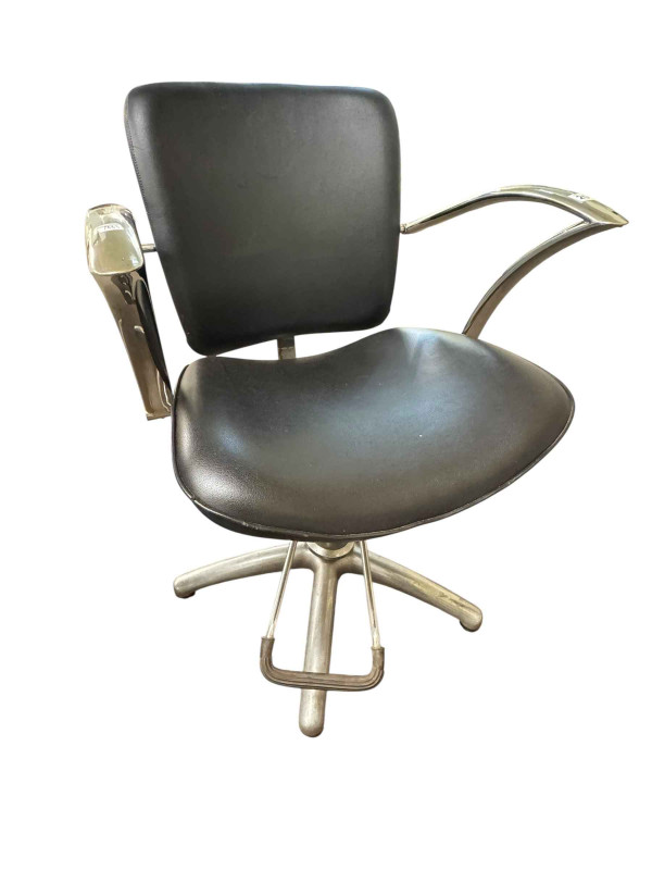 Adjustable chrome and black leather? Barbers chair.