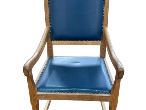 Peter 'Rabbitman' Heap oak and blue studded hide elbow chair.