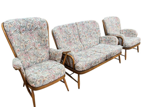 Ercol Windsor three piece suite comprising two seater settee, ladies and...