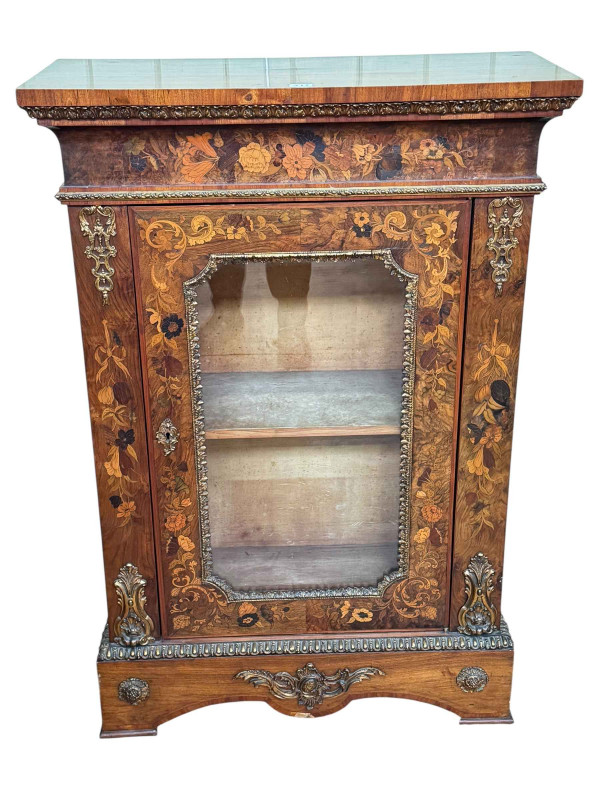 Victorian floral marquetry inlaid and gilt metal mounted glazed panel door pier cabinet, 111.5cm by 77cm by 34cm.