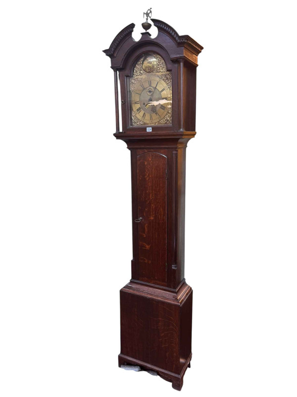 Antique oak eight day longcase clock having brass arched dial, signed Bentley, Darlington, 227cm.