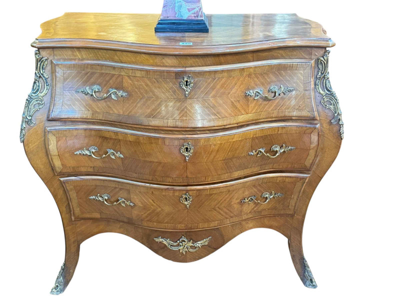 Continental walnut and gilt metal mounted three drawer serpentine front chest, 82cm by 85cm by 46cm.