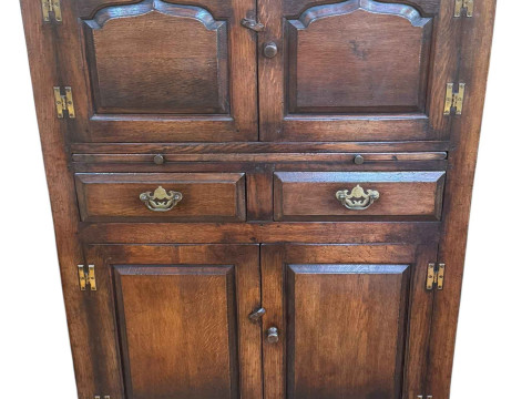 Titchmarsh & Goodwin? oak four door drinks cabinet having slide above...